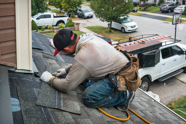 Professional Hail Damage Roof Repair technician working in Asbury Park, NJ